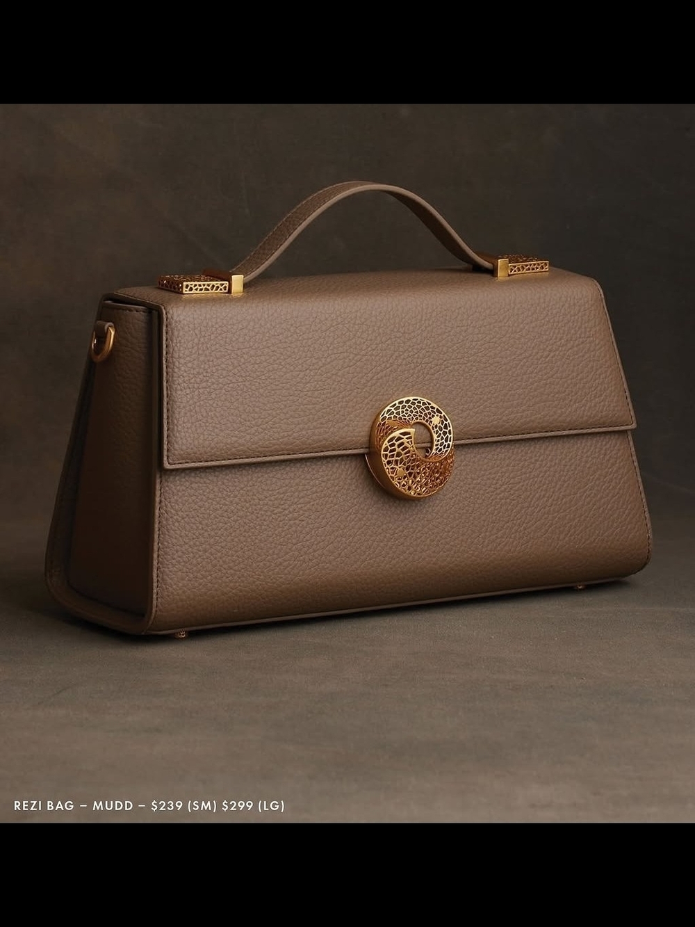 KHOI REZI Mudd Taupe Pebbled Leather Top-Handle Satchel with Gold Accent
